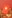 a red envelope sitting on top of a pile of gold coins