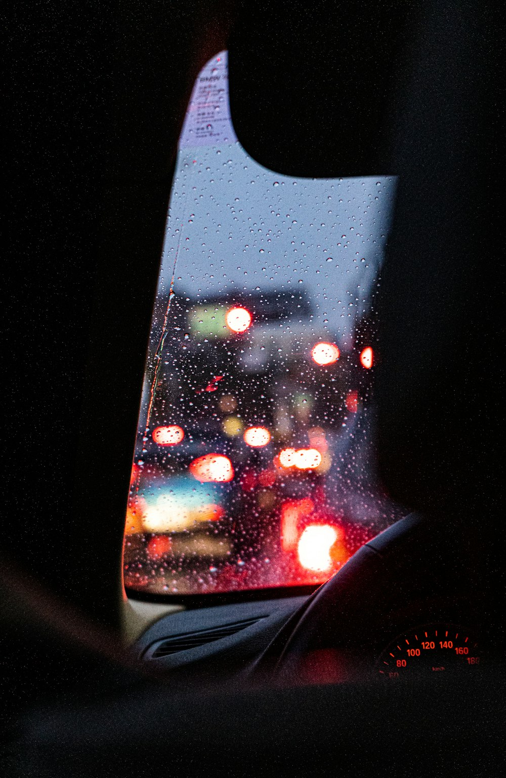 a view of a city street from inside a car