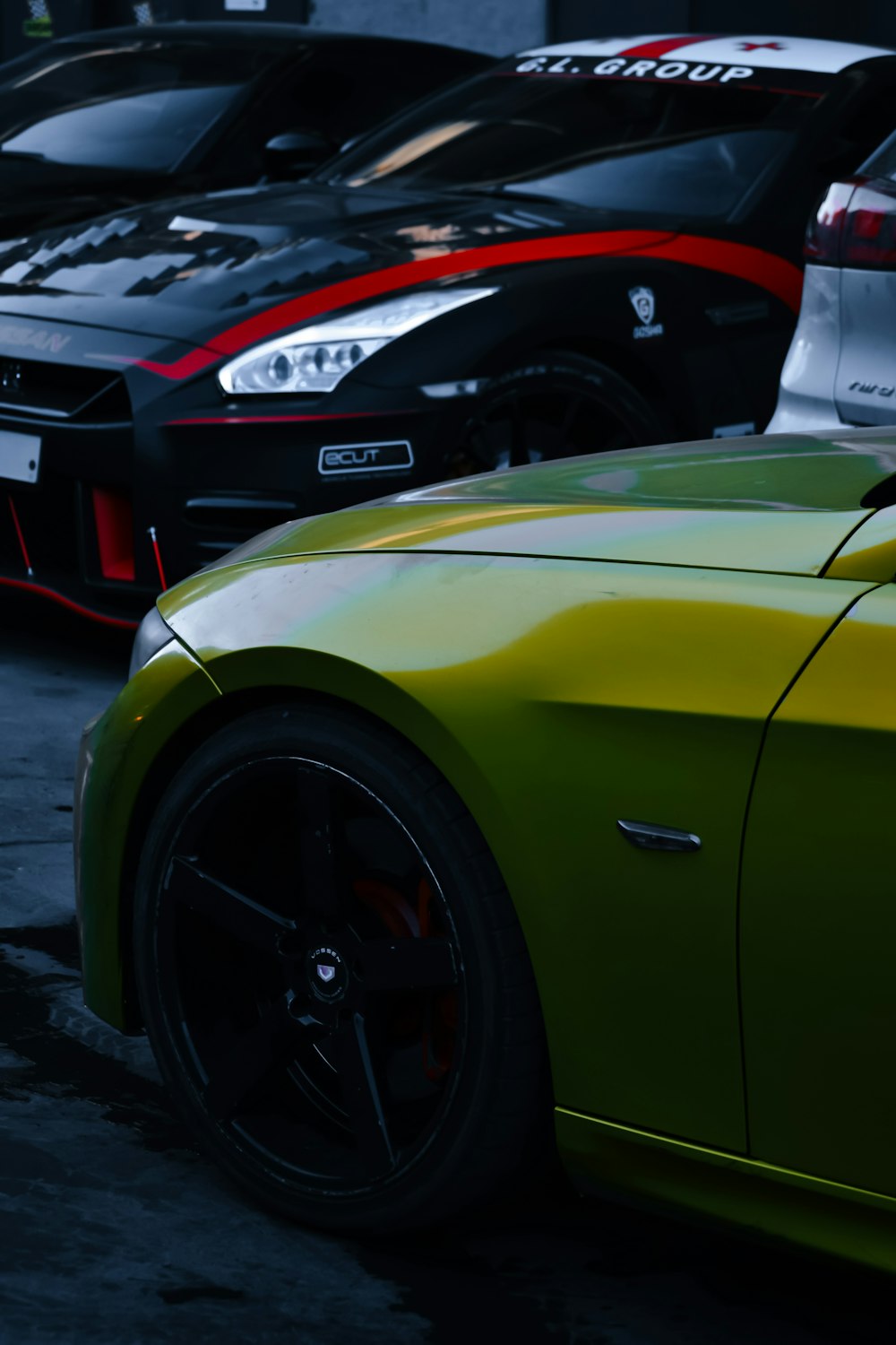 a group of cars parked next to each other