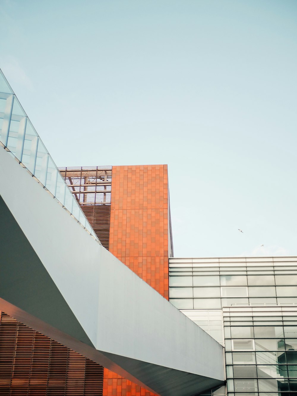 a building that has a very tall white stair case