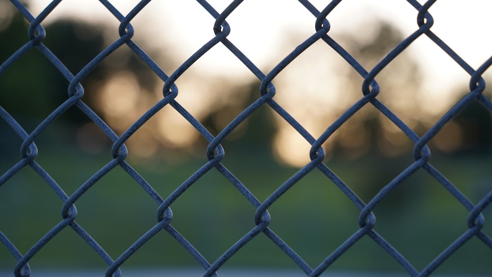 a close up of a chain link fence