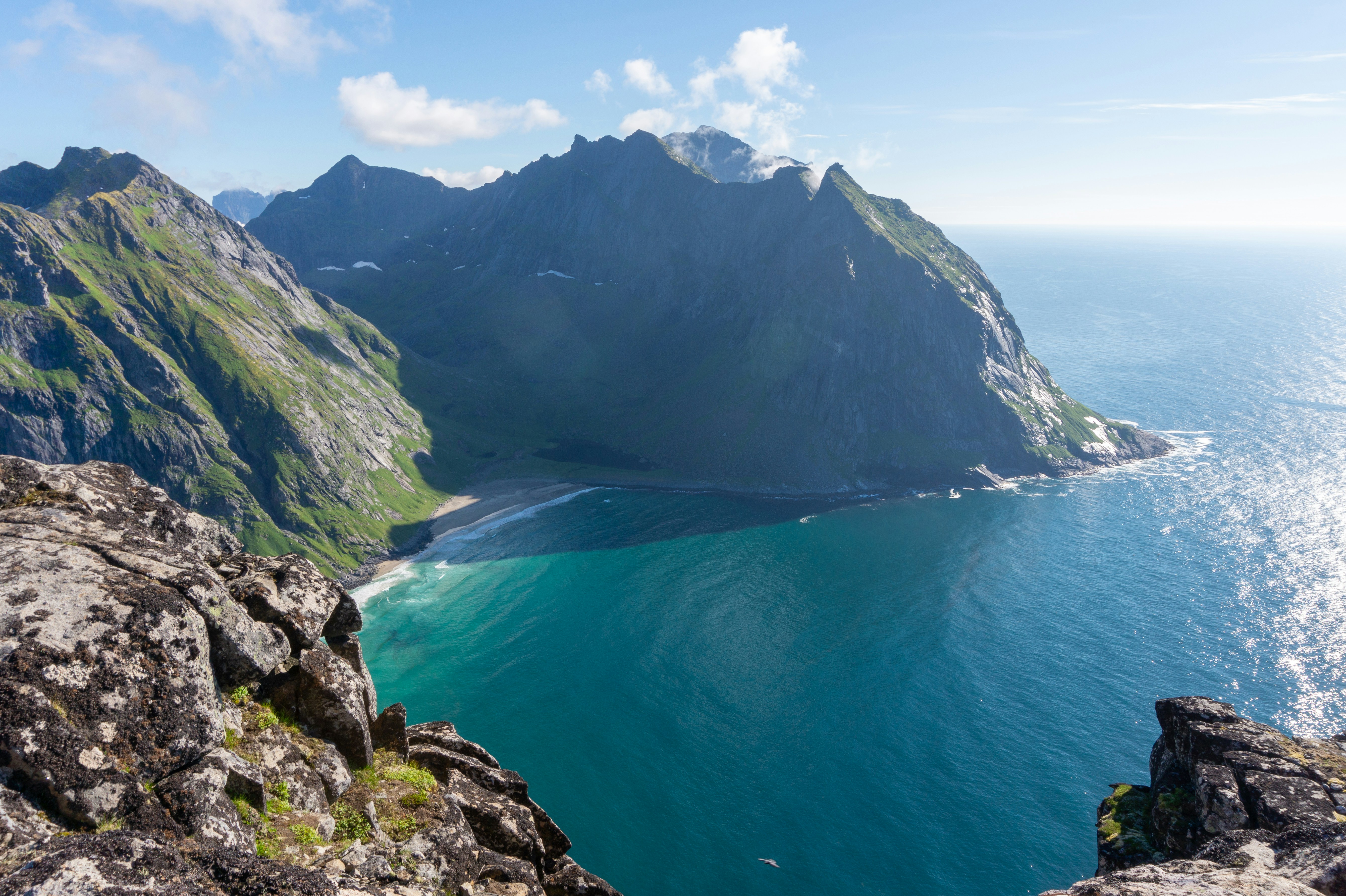 a large body of water surrounded by mountains