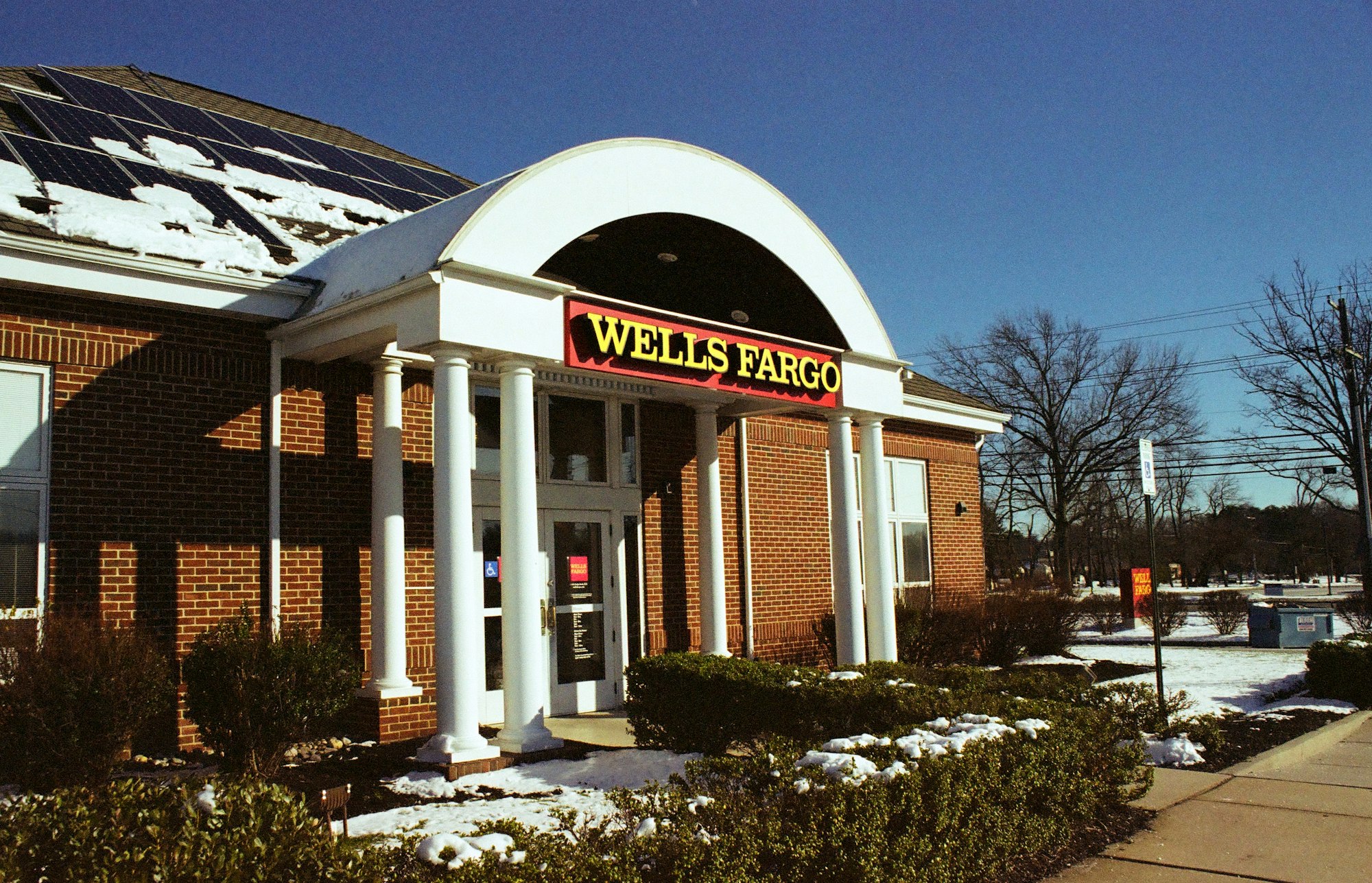 Wells Fargo bank branch with snow on the roof and ground