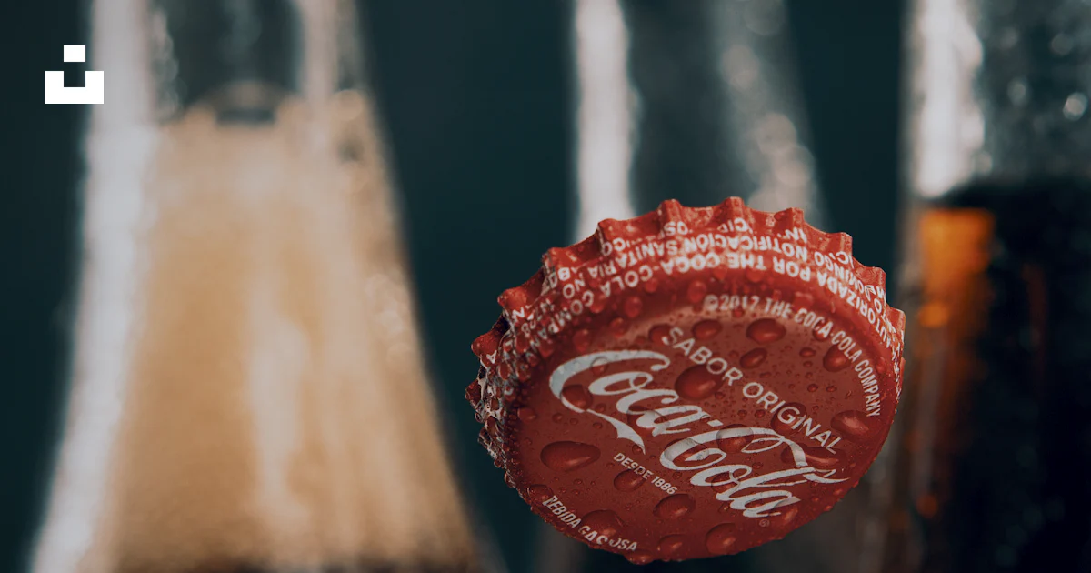 A close up of a coca - cola bottle opener photo – Free Coca cola Image ...