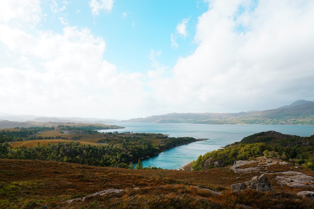 a view of a body of water from a hill