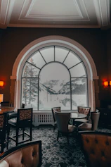 Elegant luxury suite featuring plush interiors and panoramic mountain views.