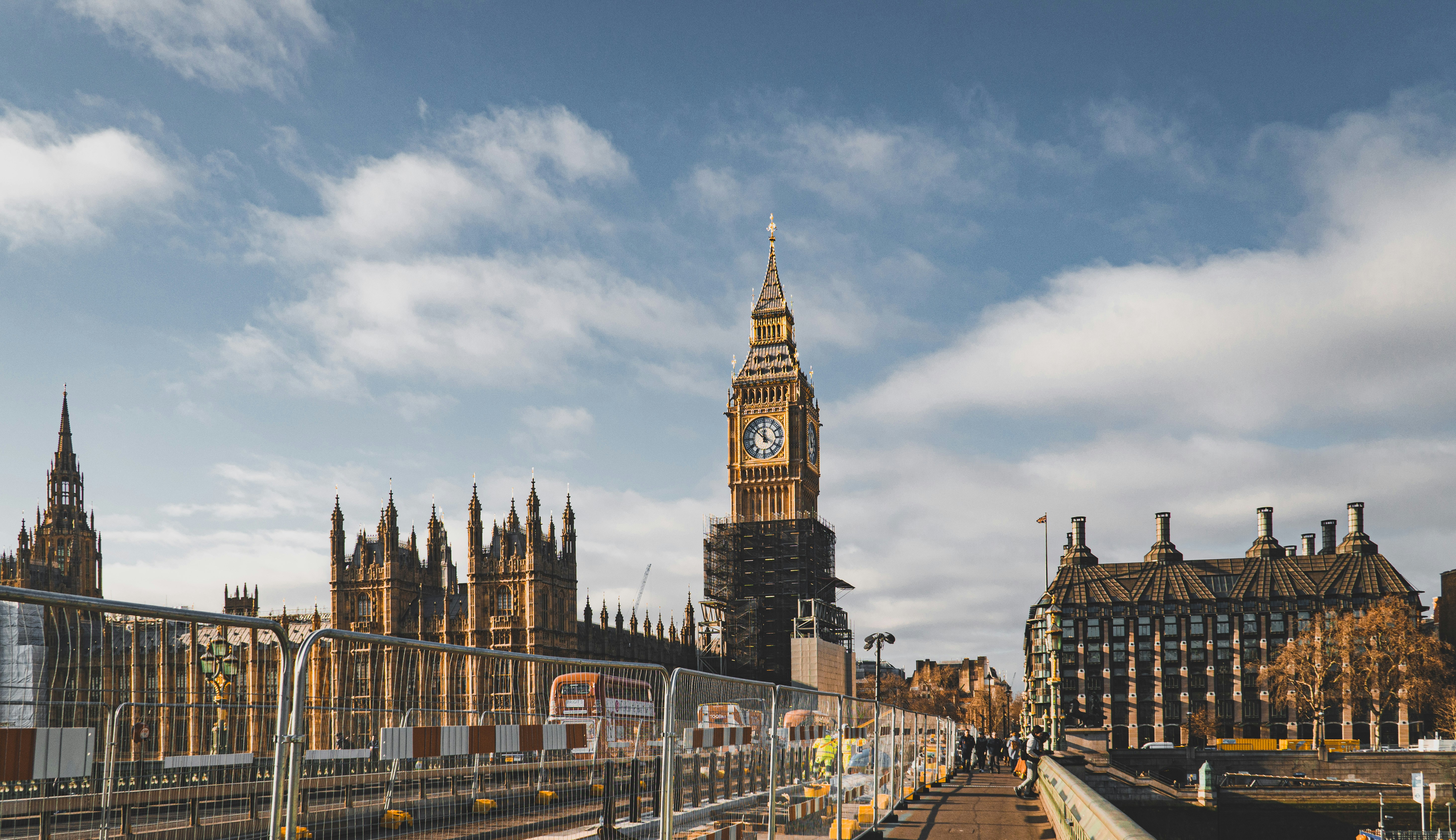 a large clock tower towering over a city