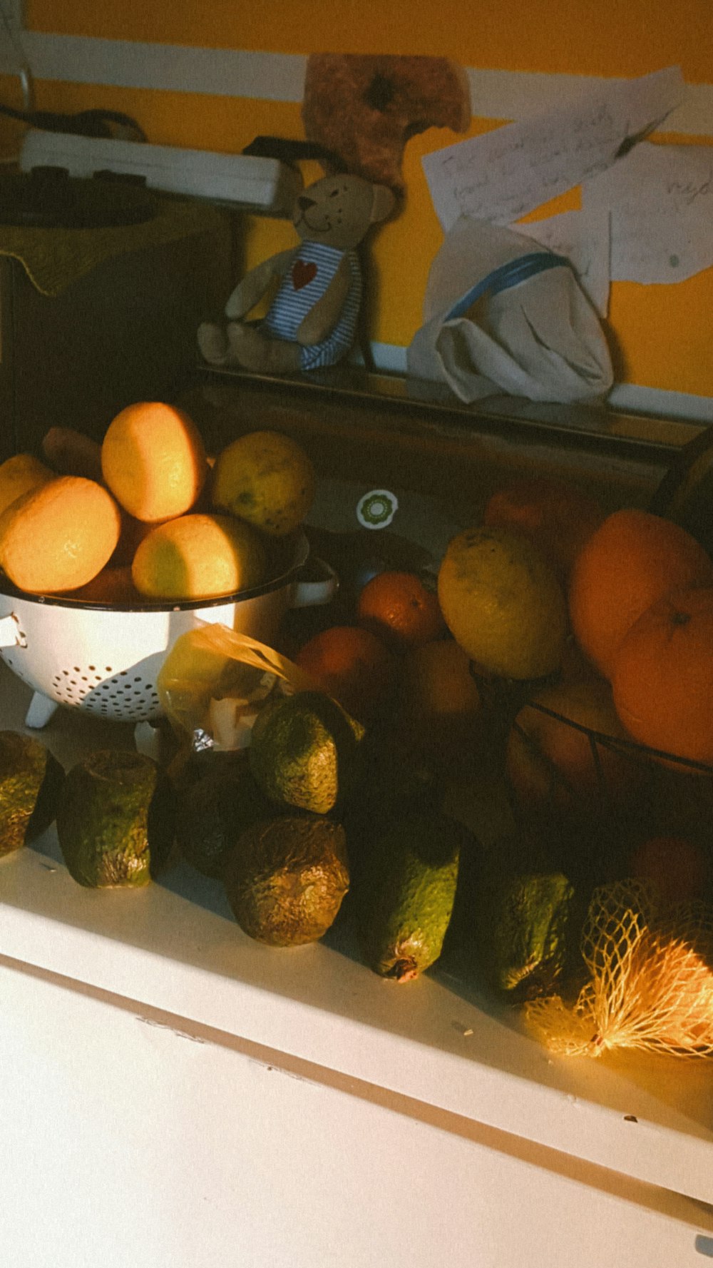 a bunch of fruit sitting on top of a counter