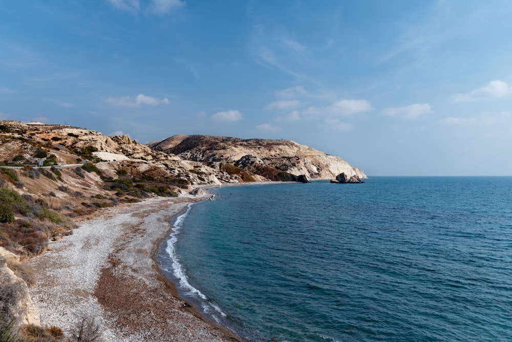 a view of a beach from a cliff