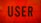 Bold, black typography spells the word 'USER' against a vibrant orange background with geometric triangular patterns.