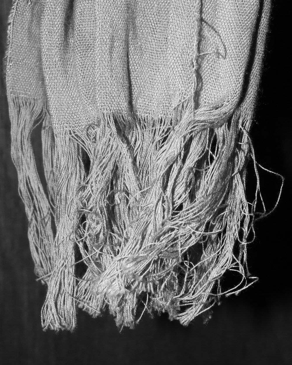 a black and white photo of a scarf