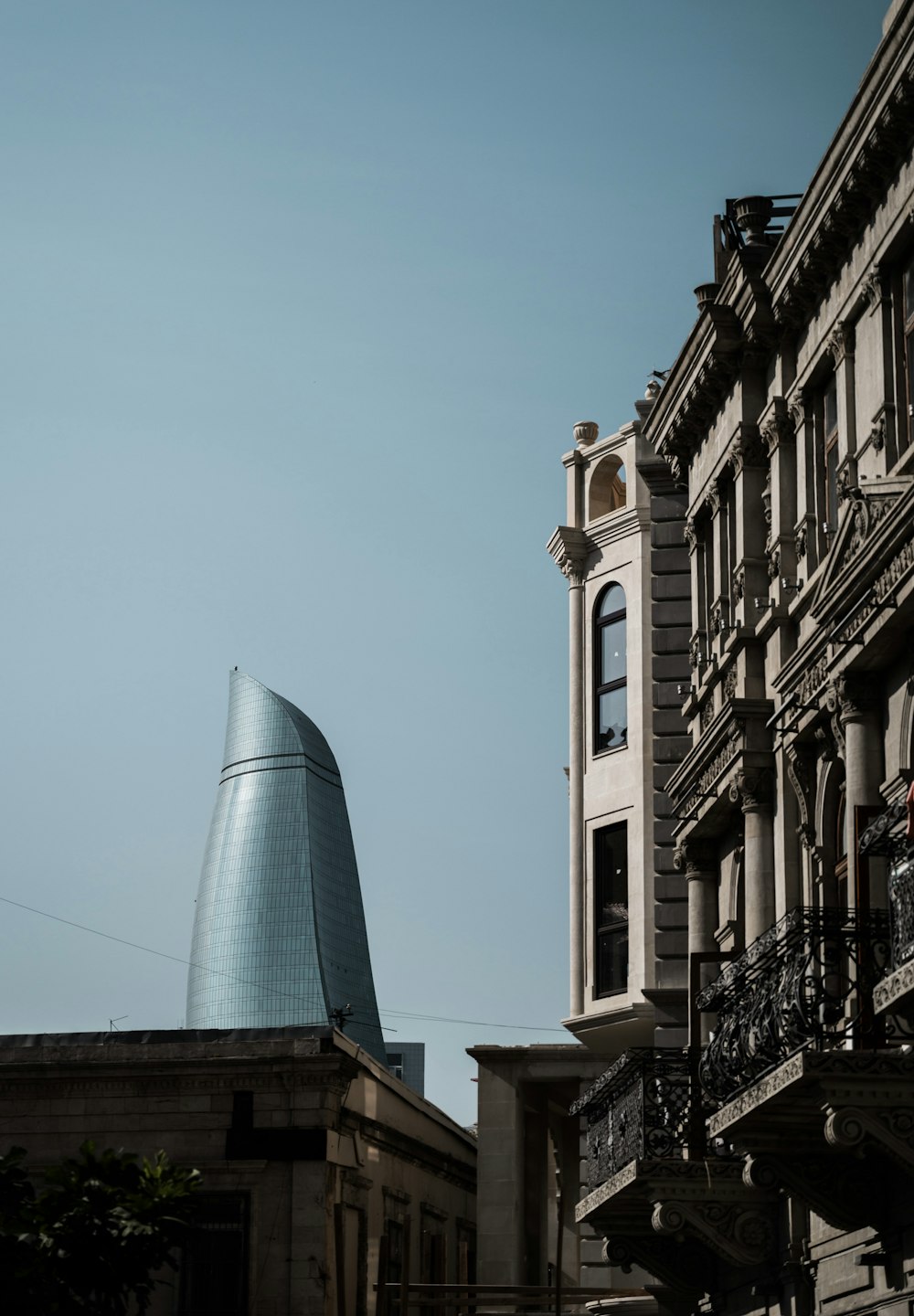 a tall building with a clock on it's side