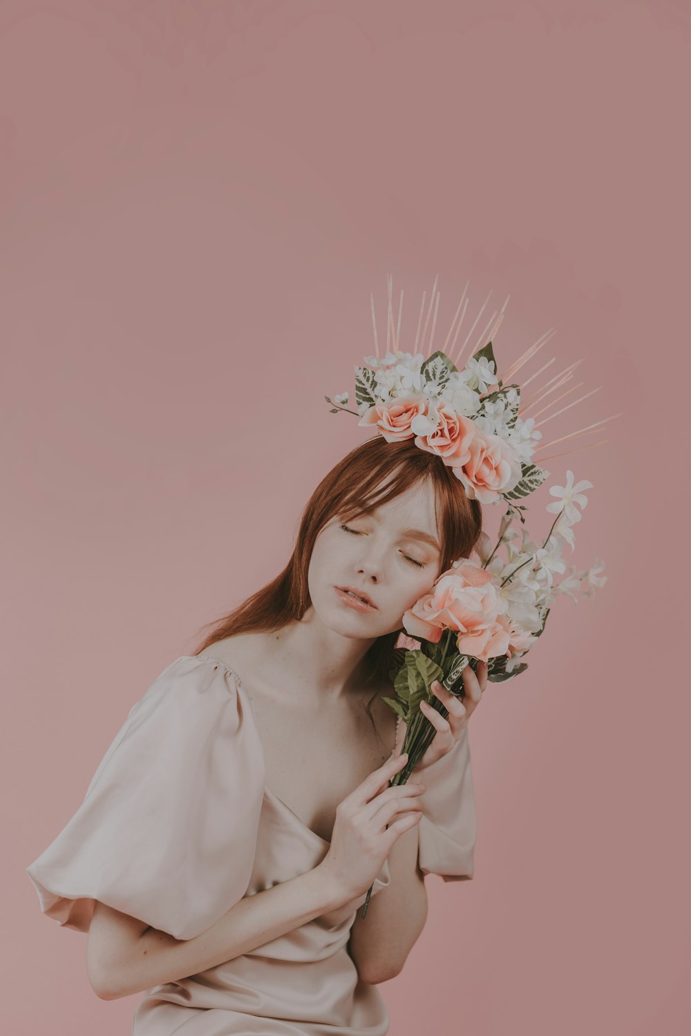 a woman with a flower crown on her head