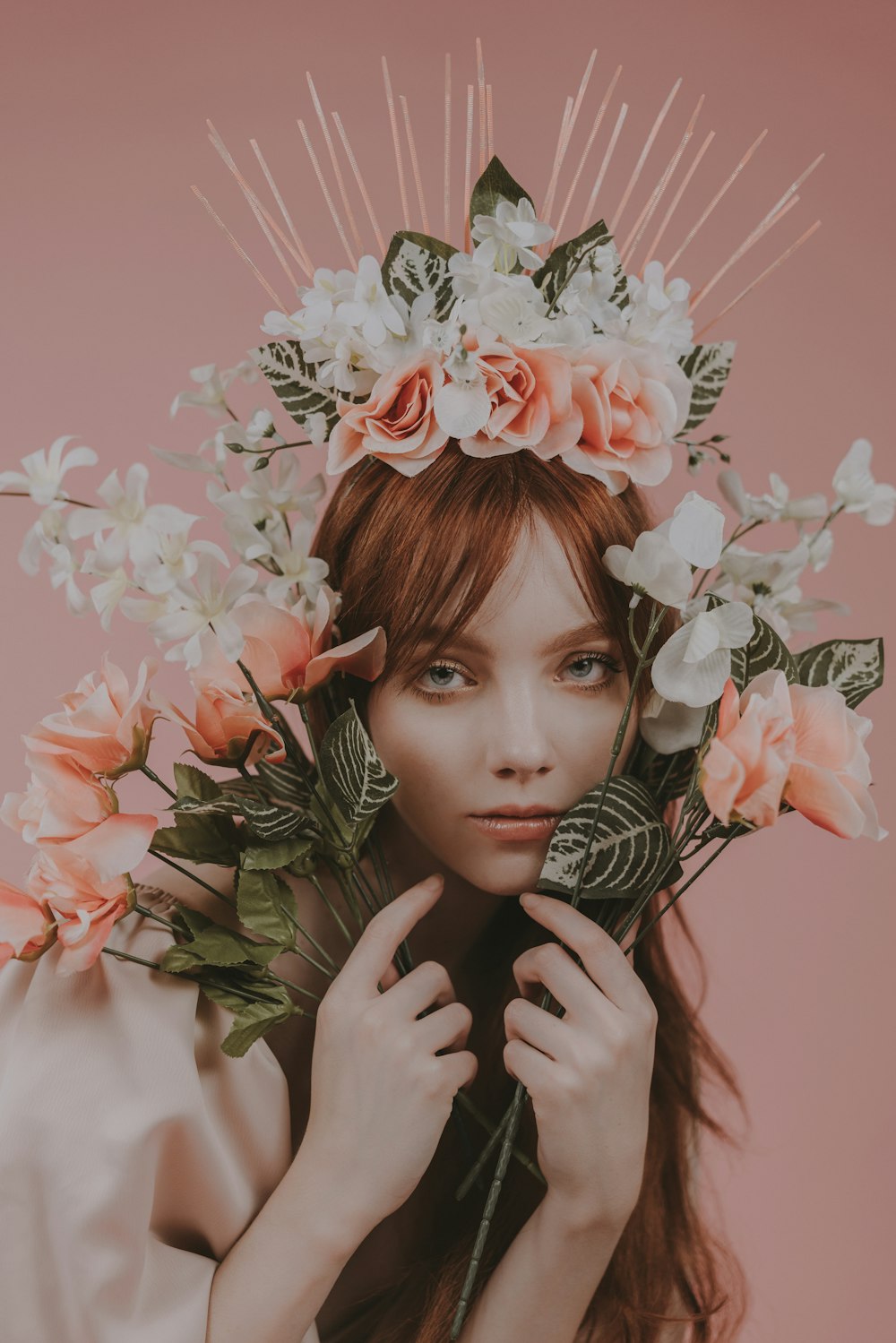 a woman with a flower crown on her head