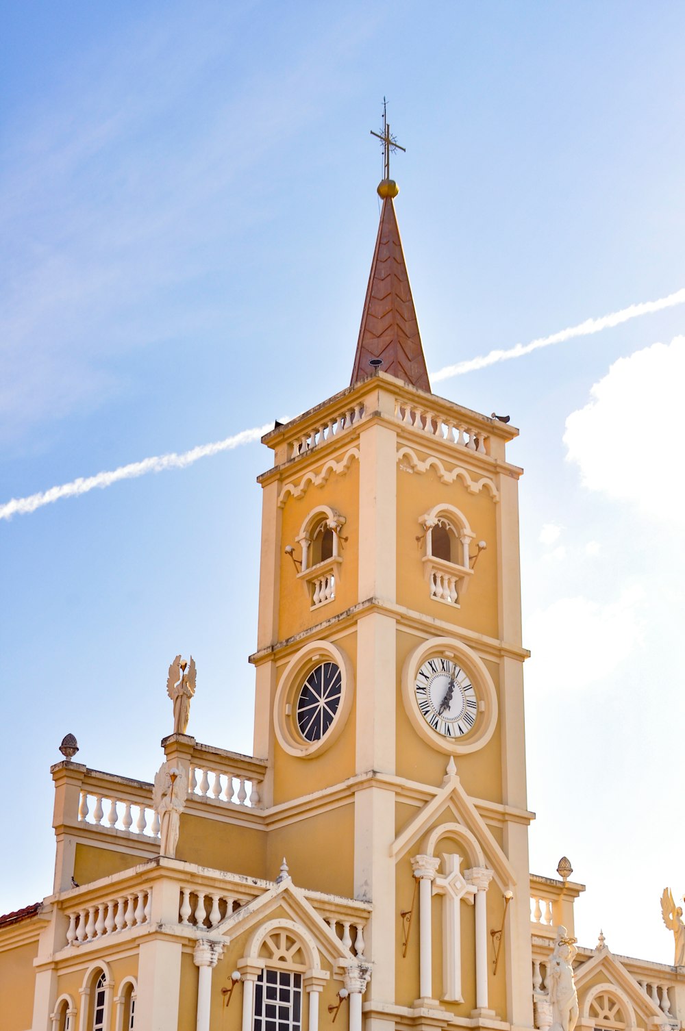 a large building with a clock on the front of it