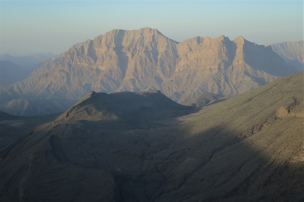 a view of a mountain range in the desert