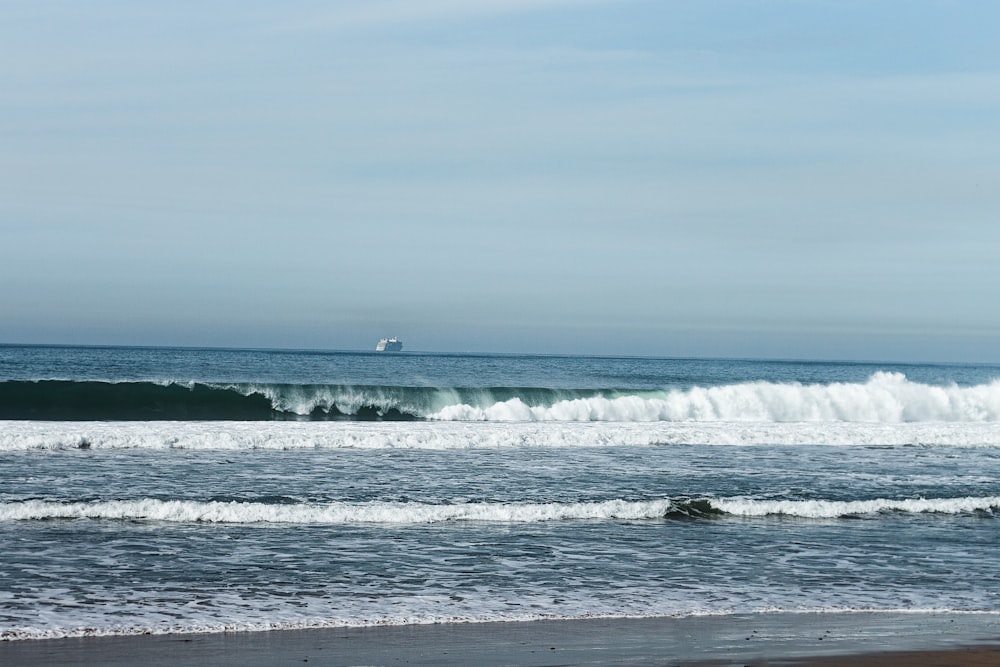 a surfer is riding a wave in the ocean