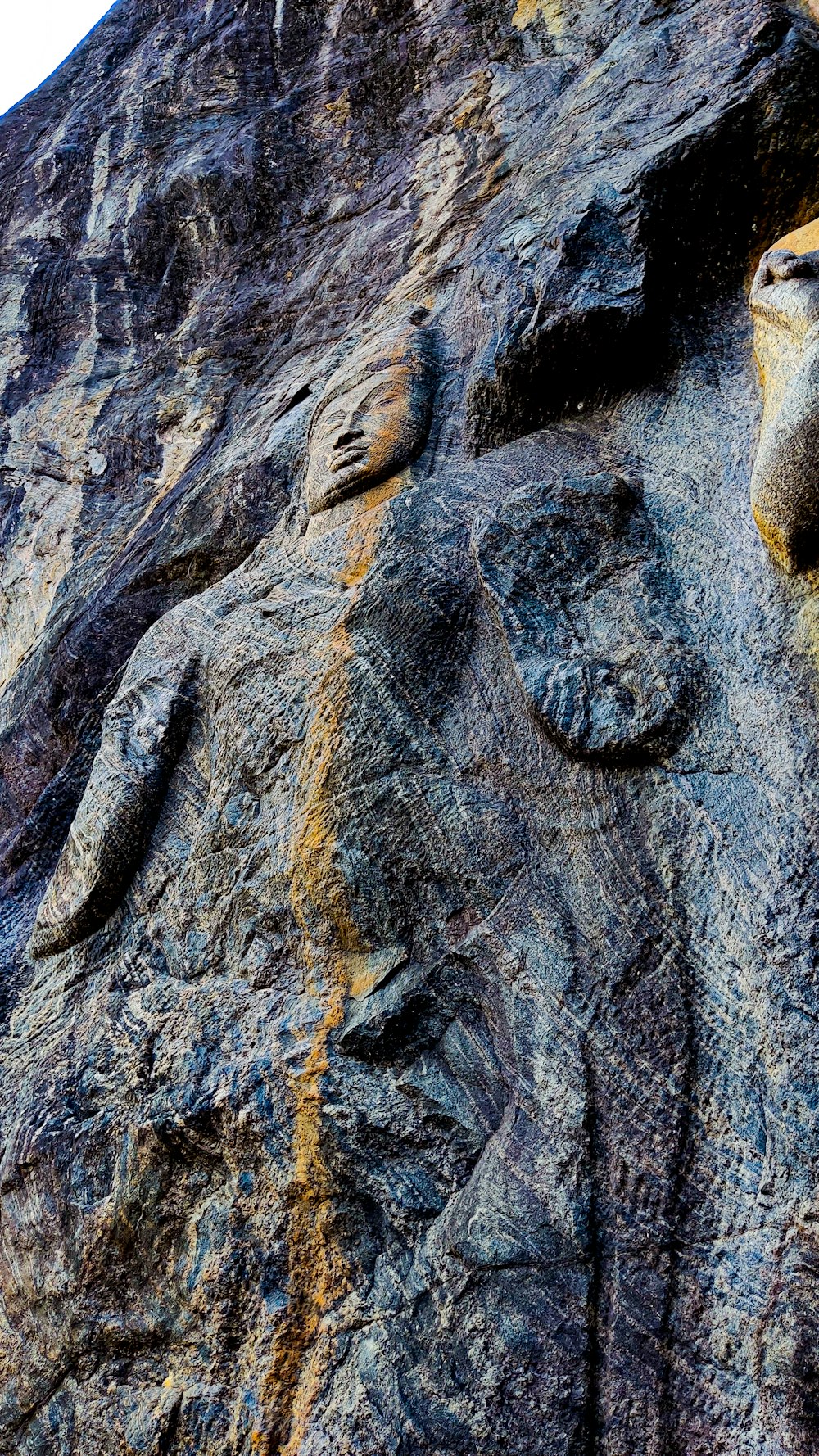 a close up of a rock face on a mountain