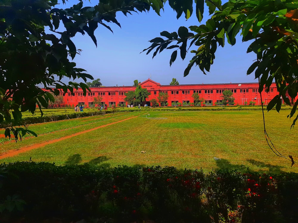 a view of a building from across a field