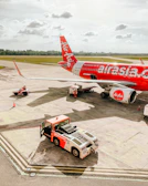 a large jetliner sitting on top of an airport tarmac