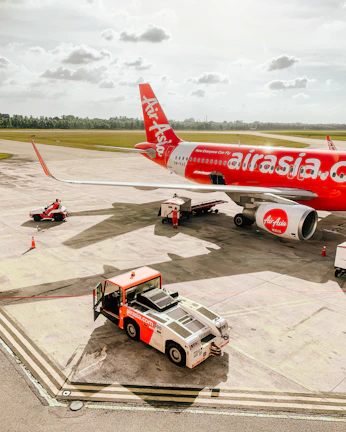a large jetliner sitting on top of an airport tarmac