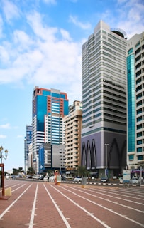 a city street with a lot of tall buildings