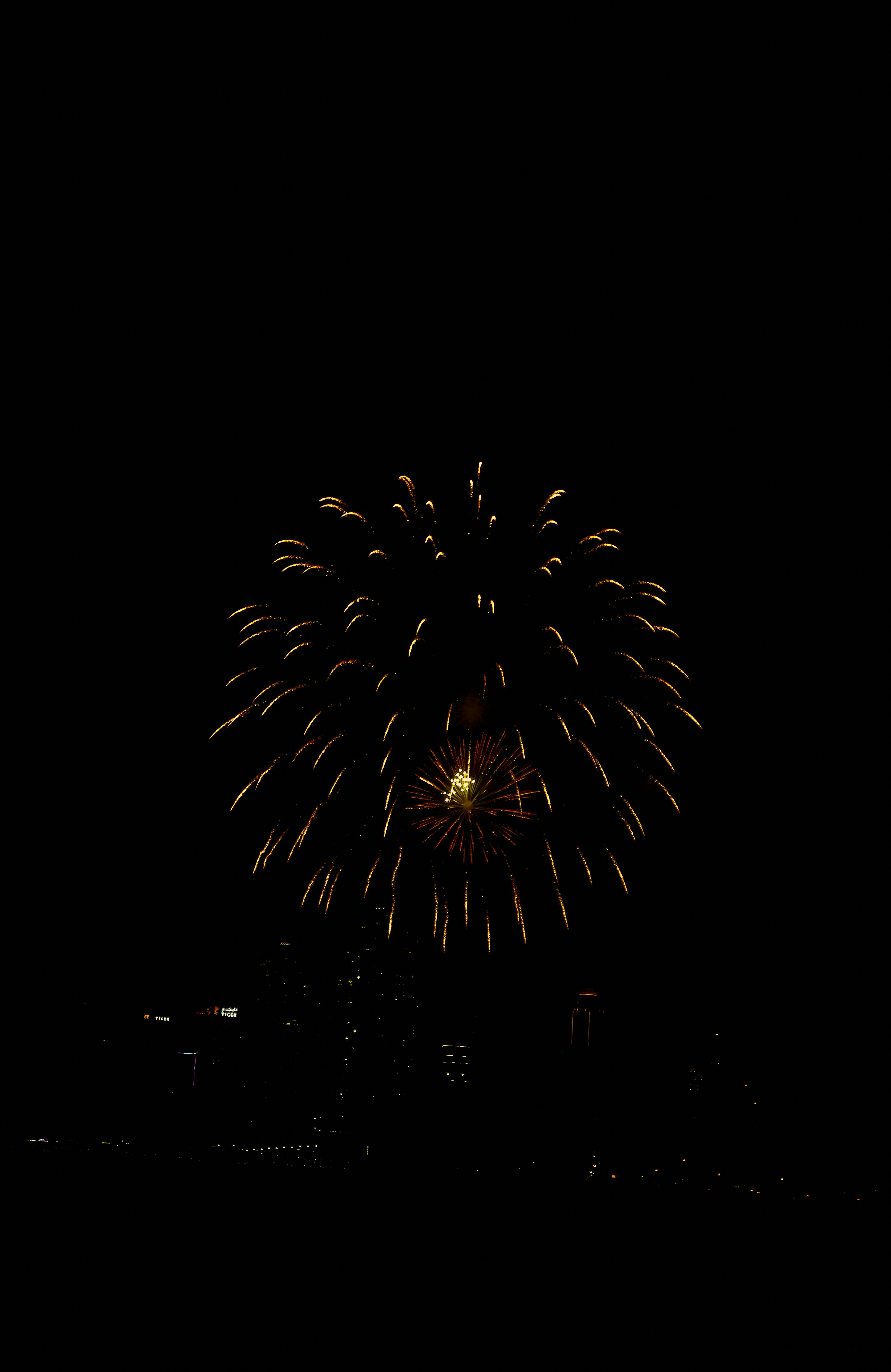 A large fireworks is lit up in the night sky photo – Free Nature Image ...