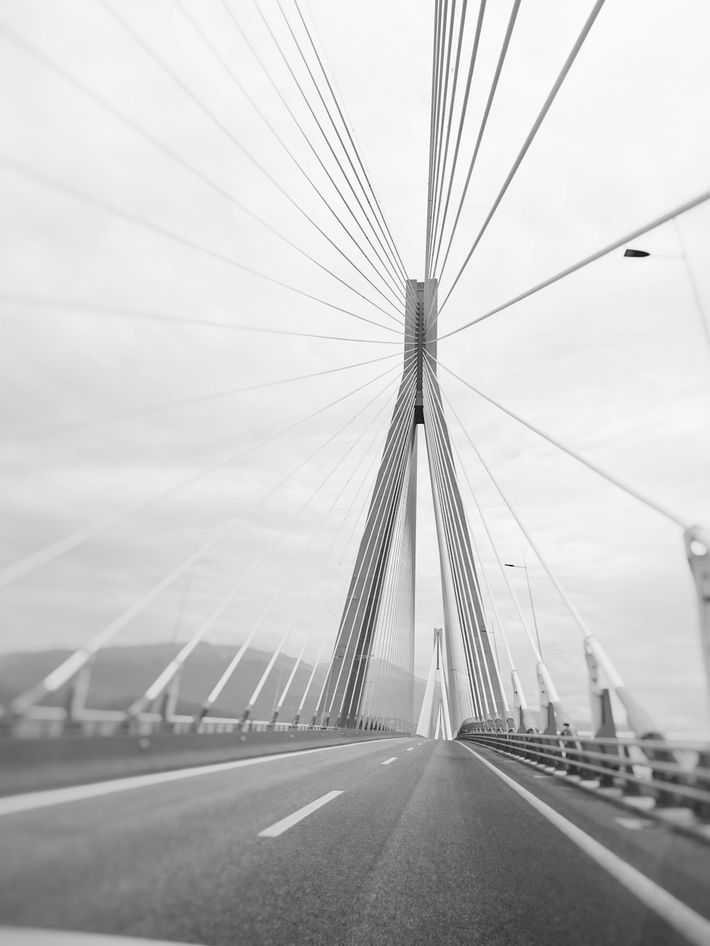 a black and white photo of a bridge