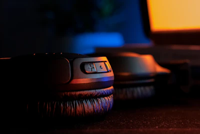 a close up of a pair of headphones on a desk