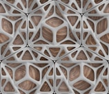 a close up of a pattern made of wood