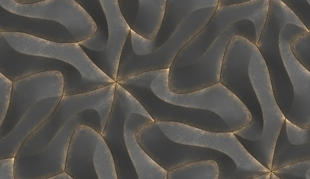 a close up view of a pattern made of wavy shapes