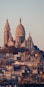 a view of a city with a church on top of it
