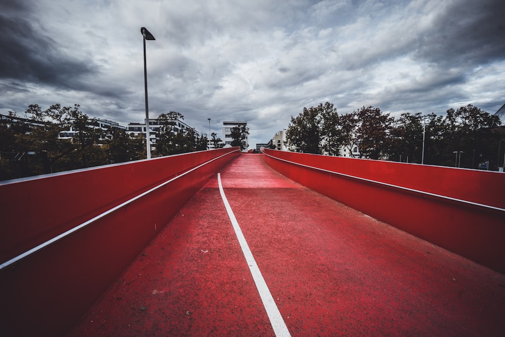 a red track with a flag on top of it