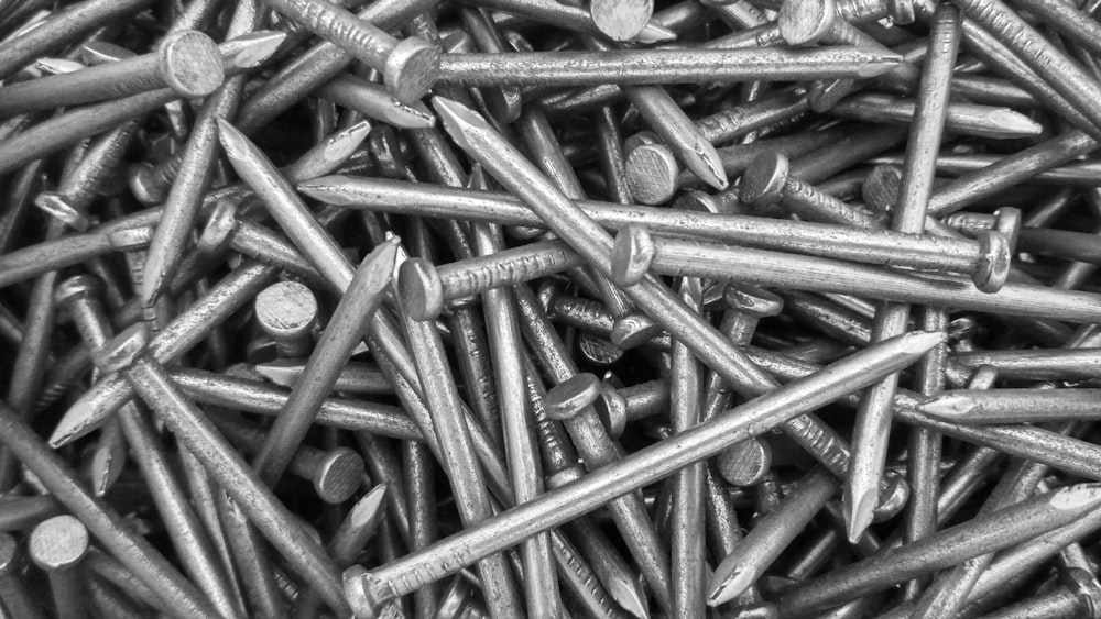 a pile of screws that are laying on top of each other