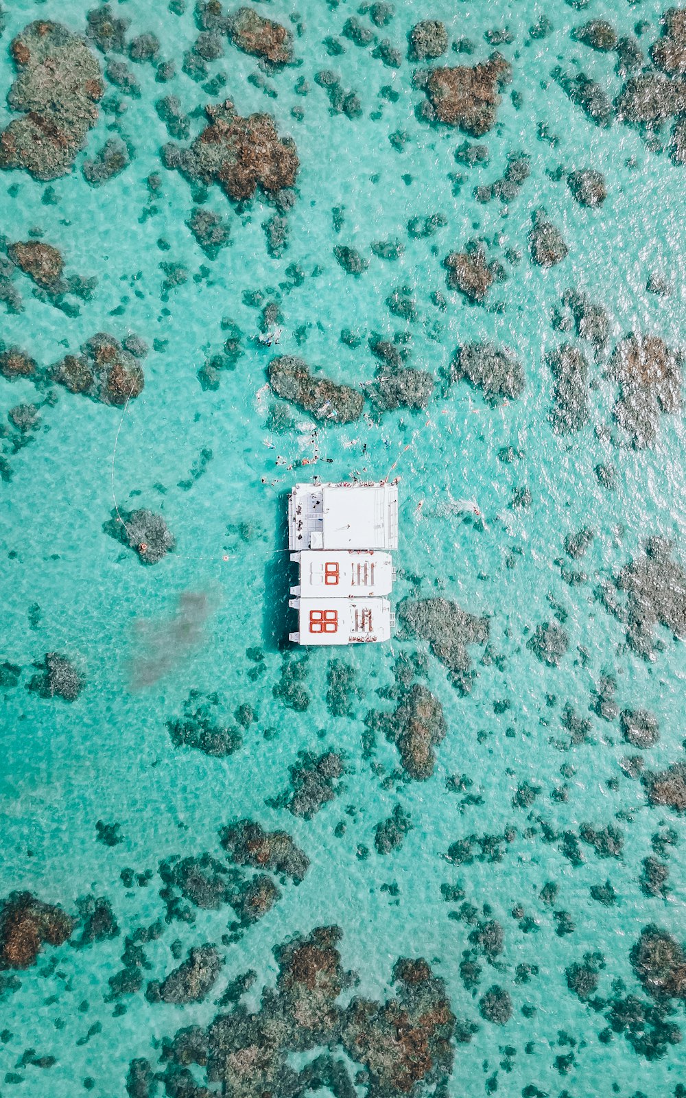 a boat floating on top of a body of water