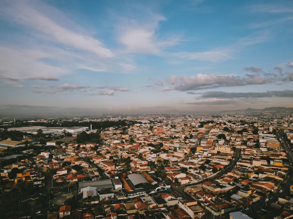 an aerial view of a city with lots of buildings