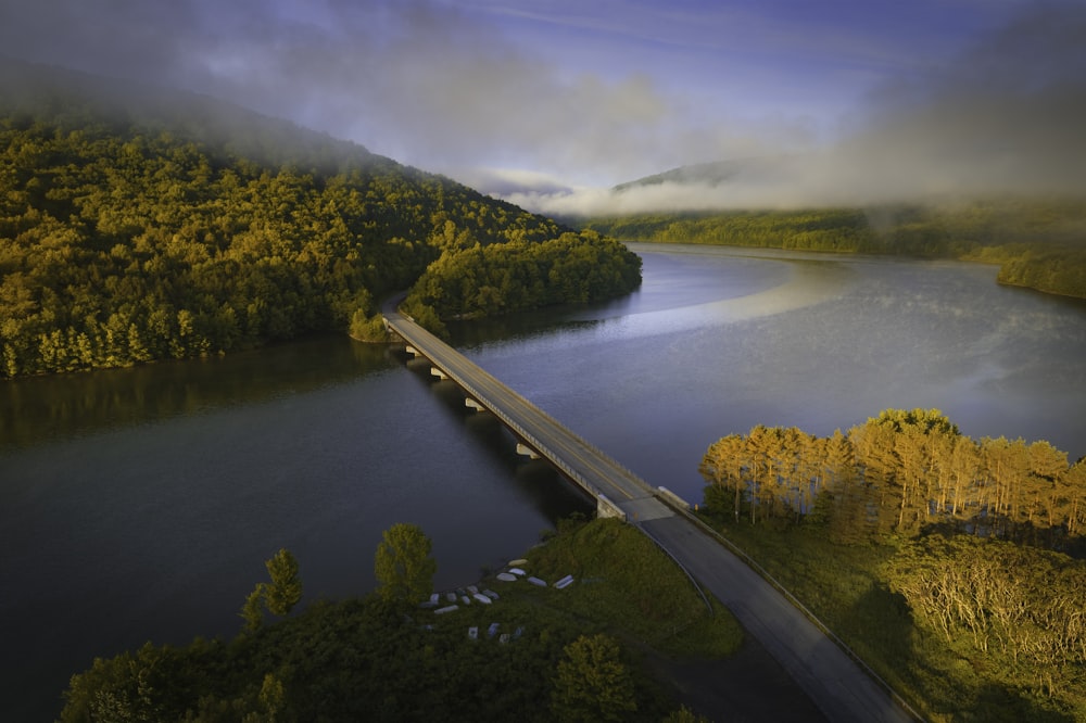 an aerial view of a bridge over a river