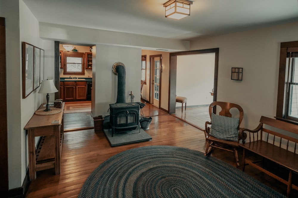 a living room filled with furniture and a fire place