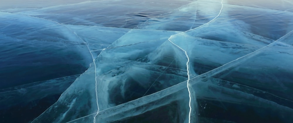 an aerial view of ice formations in the water