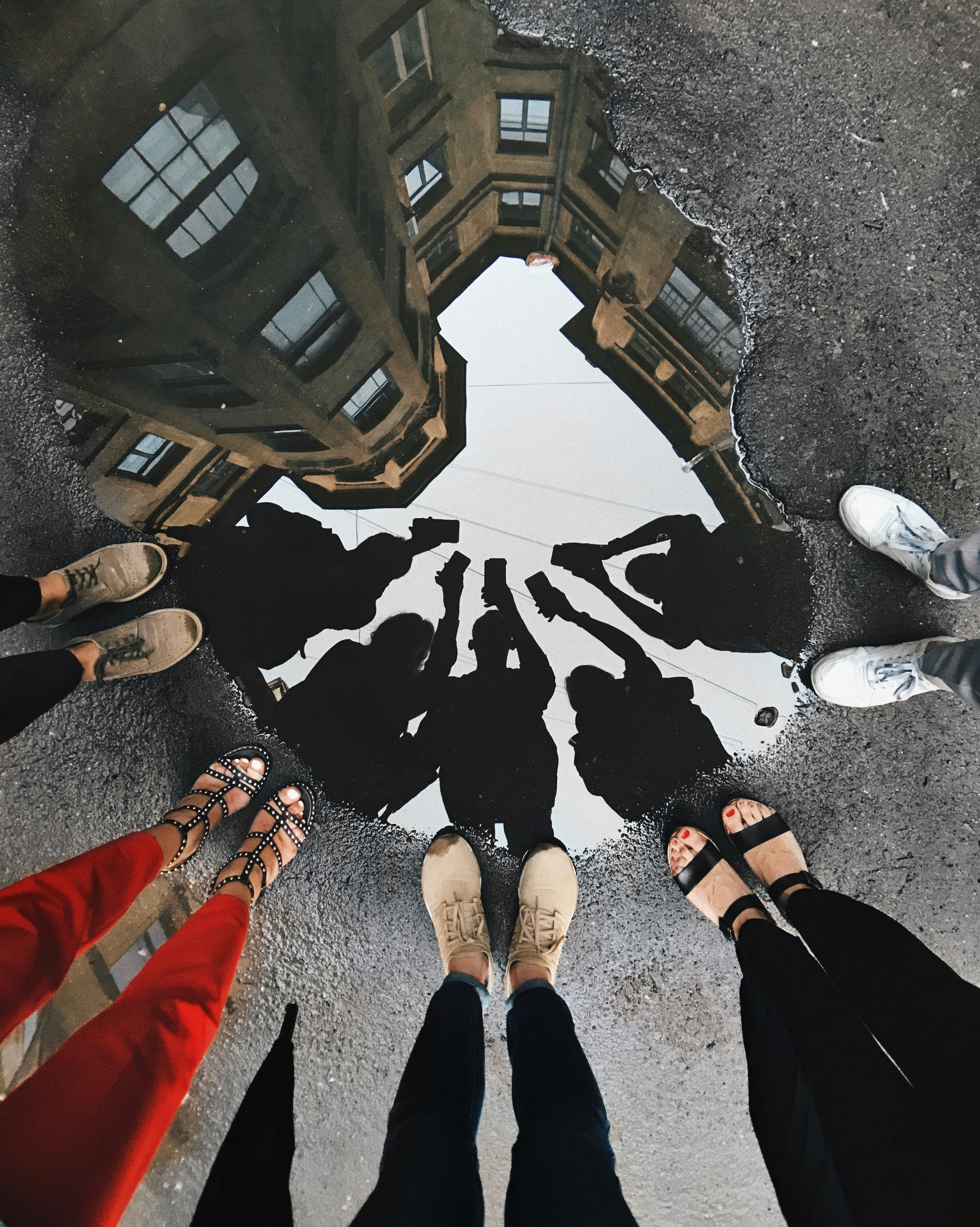 a group of people standing in front of a building