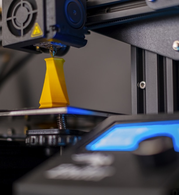 a close up of a machine with a blue light on it