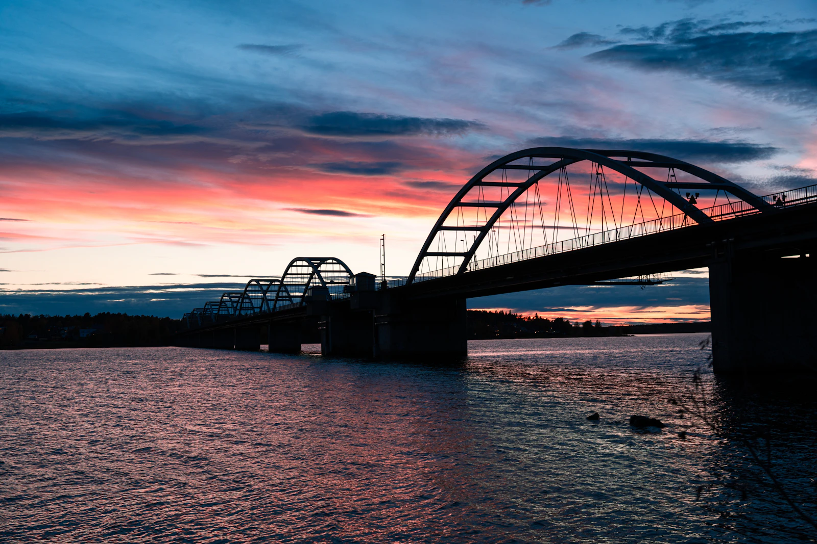 A bridge across the water at Luleå at sunset — Sweden