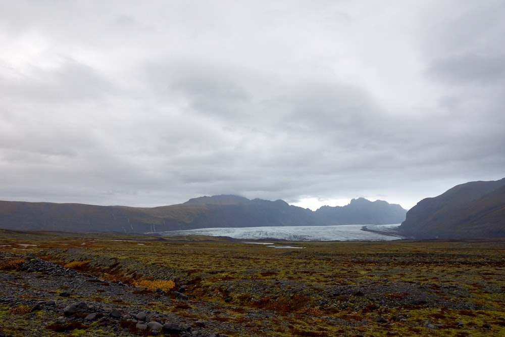 a large body of water surrounded by mountains