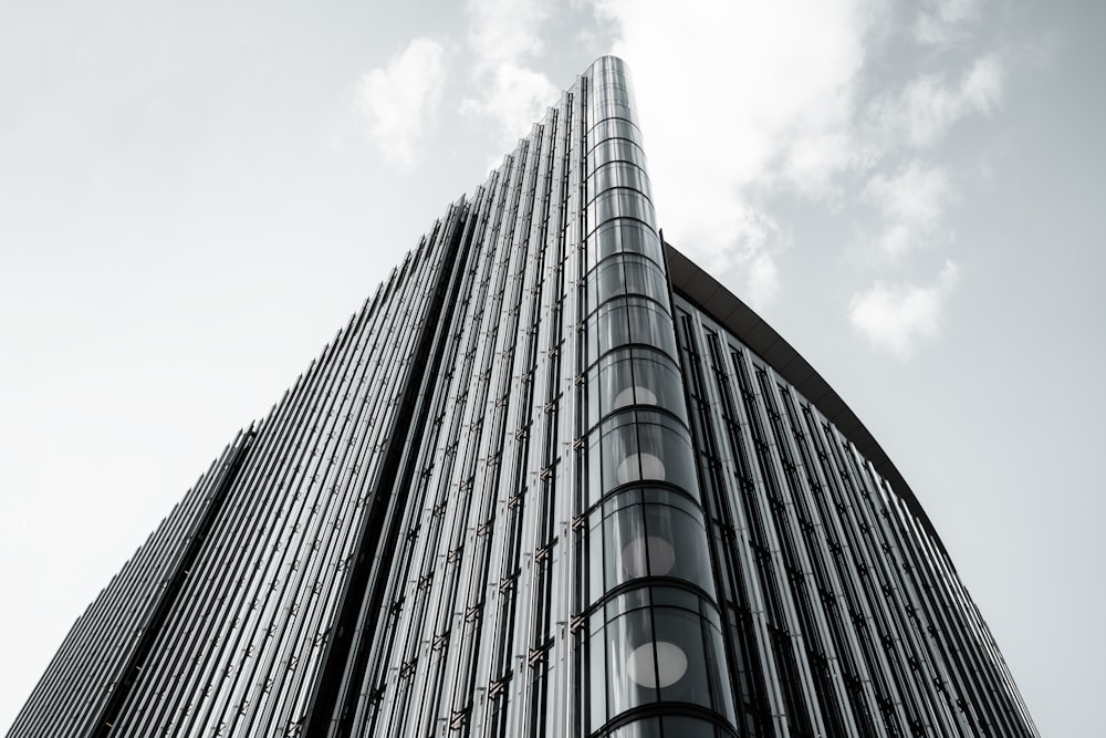 a very tall building with a sky background