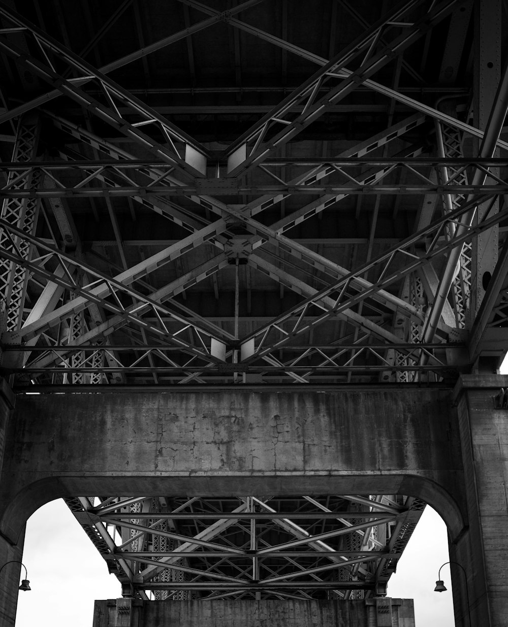 a black and white photo of a bridge