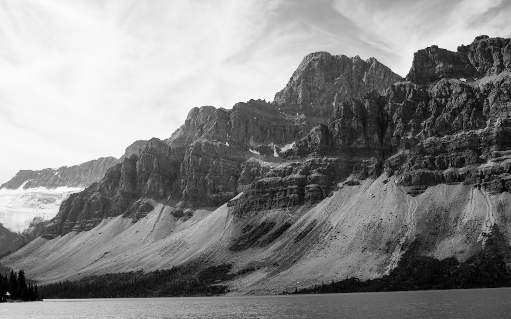 a black and white photo of a mountain range