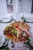 a platter of fruit and nuts on a table
