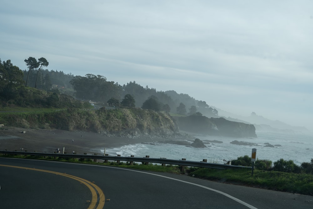 a view of the ocean from a highway