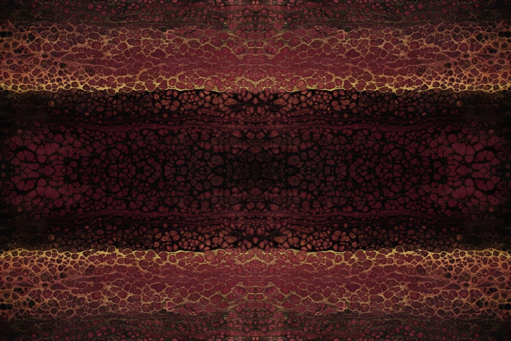a red and black background with a pattern
