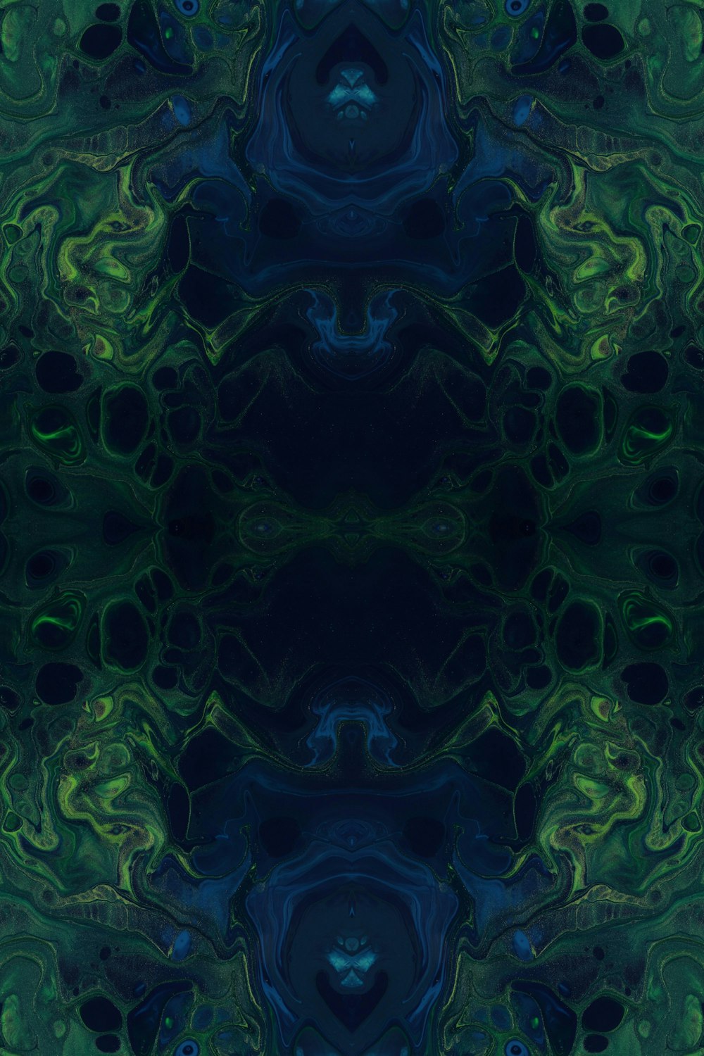 Un fondo abstracto azul y verde con un centro negro